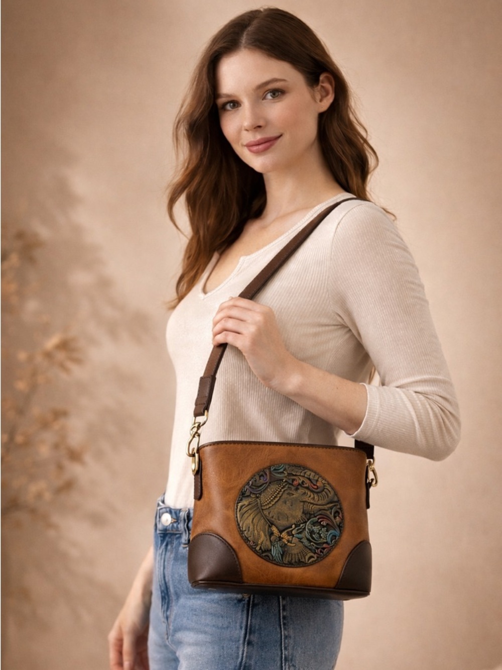 Handcrafted Brown Leather Shoulder Bag with Embossed Elephant Motif